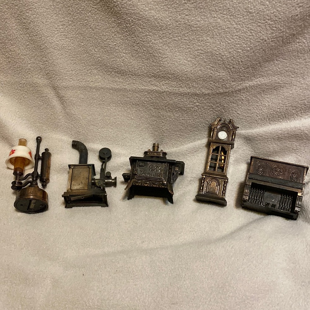 Vintage Die Cast Pencil Sharpeners. Oil lamp. Player piano. Grandfather clock.